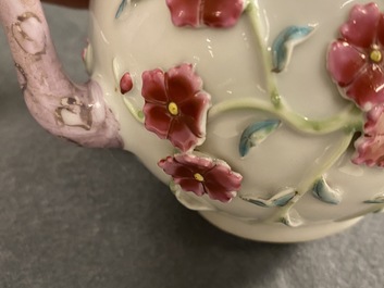 A pair of Chinese famille rose relief-decorated teapots with floral design, Yongzheng